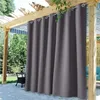 Outdoor curtains hanging on a wooden pergola over a patio. Produktbild-Vorschau