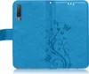 A blue flip case for a smartphone, open to show the inside. Produktbild-Vorschau