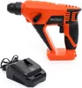 An orange and black cordless hammer drill and its charging base are shown against a white background. Podgląd zdjęcia produktu