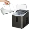 A hand pours water from a clear pitcher into an open ice maker. Náhľad obrázku produktu