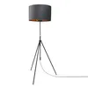 A black tripod floor lamp with a gray drum shade and gold interior. Produktbild-Vorschau