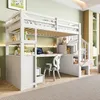 A white loft bed with a desk and storage stairs in a room with green and yellow walls. Produktbild-Vorschau