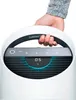 A hand is holding the handle of a white and silver air purifier. Anteprima dell’immagine prodotto