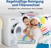 A mother and child are happily posing in front of a washing machine with laundry. Produktbild-Vorschau