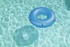 A blue inflatable swimming ring floating on the surface of clear blue water. Náhľad obrázku produktu