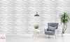 A modern living room scene with 3D wall panels, a chair, a small table with a plant, and a floor lamp. Anteprima dell’immagine prodotto