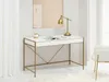 A white desk with gold accents, a gold lamp, and a mug on top, set against a white wall and curtain. Anteprima dell’immagine prodotto