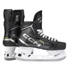 A pair of black CCM Tacks XF70 senior ice hockey skates are shown from a side-angle, with the left skate slightly behind the right. Podgląd zdjęcia produktu