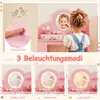 A collage showing a child using a pink toy vanity, with close-ups of the light switch and different lighting modes of the mirror. Náhled obrázku produktu
