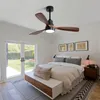 A bedroom with a ceiling fan above a bed. Produktbild-Vorschau