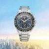 A watch is shown against a backdrop of a city skyline and a bright sky. Produktbild-Vorschau