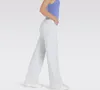 A person wearing white wide-leg jeans and a blue tank top, shown from the side. Produktbild-Vorschau