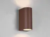 A brown outdoor wall light mounted on a light gray wall. Voir les images du produit