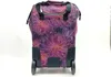 A rolling bag with a floral pattern. Voir les images du produit
