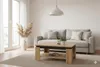 A living room scene with a couch and coffee table. Produktbild-Vorschau