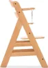 A side view of a wooden high chair against a white background. Produktbild-Vorschau