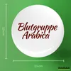 Huuraa Button Blutgruppe Arabica Schriftzug 25mm rund mit Produktbild-Vorschau 3