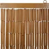 A close-up view of a beaded curtain made of cylindrical brown beads hanging from a wooden bar. Anteprima dell’immagine prodotto