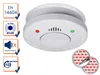 A smoke detector with accompanying informational graphics and adhesive pads. Produktbild-Vorschau