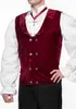 A man wearing a red velvet vest over a white ruffled shirt. Produktbild-Vorschau