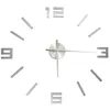 A 3D wall clock with silver numbers and hands on a white background. Náhľad obrázku produktu
