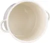 A top-down view of an empty cream-colored enamel pot with two handles. Podgląd zdjęcia produktu