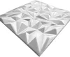 A white, geometric 3D wall panel with a faceted surface, presented on a white background. Produktbild-Vorschau