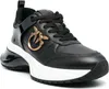 A studio shot of a black sneaker. Náhled obrázku produktu
