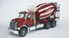 A red and white Mack Granite cement mixer truck is shown against a white background. Podgląd zdjęcia produktu