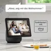 A smart display device showing a family in a living room, with a speech bubble indicating a voice command and a "works with Alexa" badge. Podgląd zdjęcia produktu