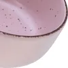 A close-up view of the rim and interior of a pink speckled bowl. Náhľad obrázku produktu