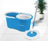 A blue spin mop and bucket set is displayed on a tiled floor next to a potted plant. Náhľad obrázku produktu