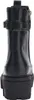 A back view of a black Guess Chelsea boot with a platform sole. Voir les images du produit
