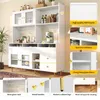 A white kitchen buffet with glass doors and gold accents, featuring various kitchen items and coffee maker. Includes close-up shots of product features. Produktbild-Vorschau