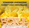 Wooden letters spelling 'Boill' are placed in front of sunflowers and sunflower seeds. Produktbild-Vorschau