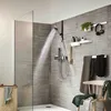 A modern bathroom with a shower, featuring a hansgrohe Pulsify S Handbrause. Anteprima dell’immagine prodotto