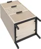 A wooden and metal nightstand with three drawers is shown from a slightly elevated side angle against a white background. Podgląd zdjęcia produktu