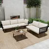 An outdoor patio setting with a sofa set and coffee table. Anteprima dell’immagine prodotto