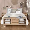 A bedroom scene with a bed, nightstands, and a bench. Náhled obrázku produktu