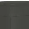 A close-up view of the corner of a dark gray upholstered ottoman. Náhľad obrázku produktu