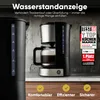 A coffee maker and a kettle are shown on a countertop, with marketing text and awards. Anteprima dell’immagine prodotto