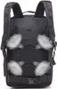 The back of a black tactical backpack with white vapor effects indicating ventilation. Náhled obrázku produktu