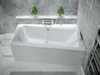 A modern bathroom with a white bathtub filling with water. Produktbild-Vorschau
