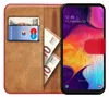 A red book-style phone case with a Samsung Galaxy phone inside, showing a credit card and euro banknotes. Náhľad obrázku produktu