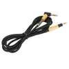 A black audio cable with gold connectors is coiled on a white background. Náhľad obrázku produktu