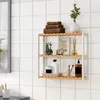 A wall-mounted shelving unit with bathroom accessories, placed against a tiled wall. Náhled obrázku produktu