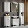 A modern white bathroom vanity set with a sink, mirror, and cabinets against a dark gray wall. Podgląd zdjęcia produktu