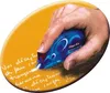 A hand is using a blue Tipp-Ex mouse-shaped correction tape dispenser to correct text on a yellow background with handwritten text. Anteprima dell’immagine prodotto