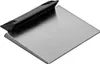A product shot of a metal scraper with a black handle. Produktbild-Vorschau