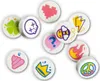 A collection of small, round, decorative pins or charms with various icons, arranged on a white background. Produktbild-Vorschau